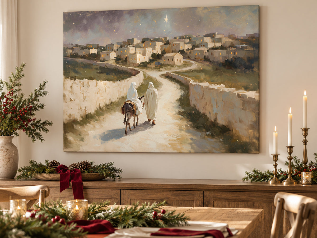 The Road to Bethlehem as an unframed canvas in a dining room styled with evergreen and brass for Christmas