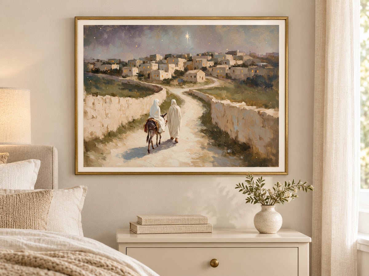 The Road to Bethlehem in a slim gold frame in a quiet neutral bedroom