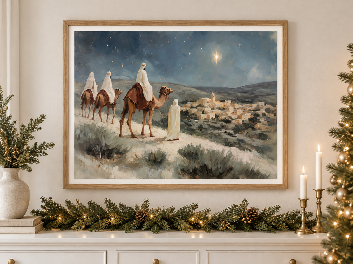 Within Sight of Bethlehem in an oak frame above a console styled with evergreen and brass for Christmas