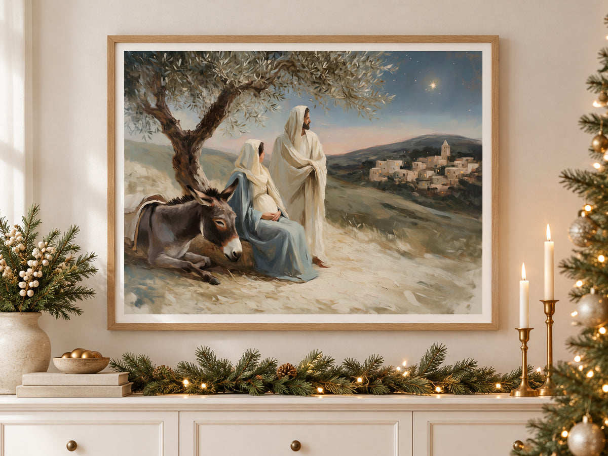 A Promise Near at Hand in an oak frame above a console styled with evergreen and brass for Christmas