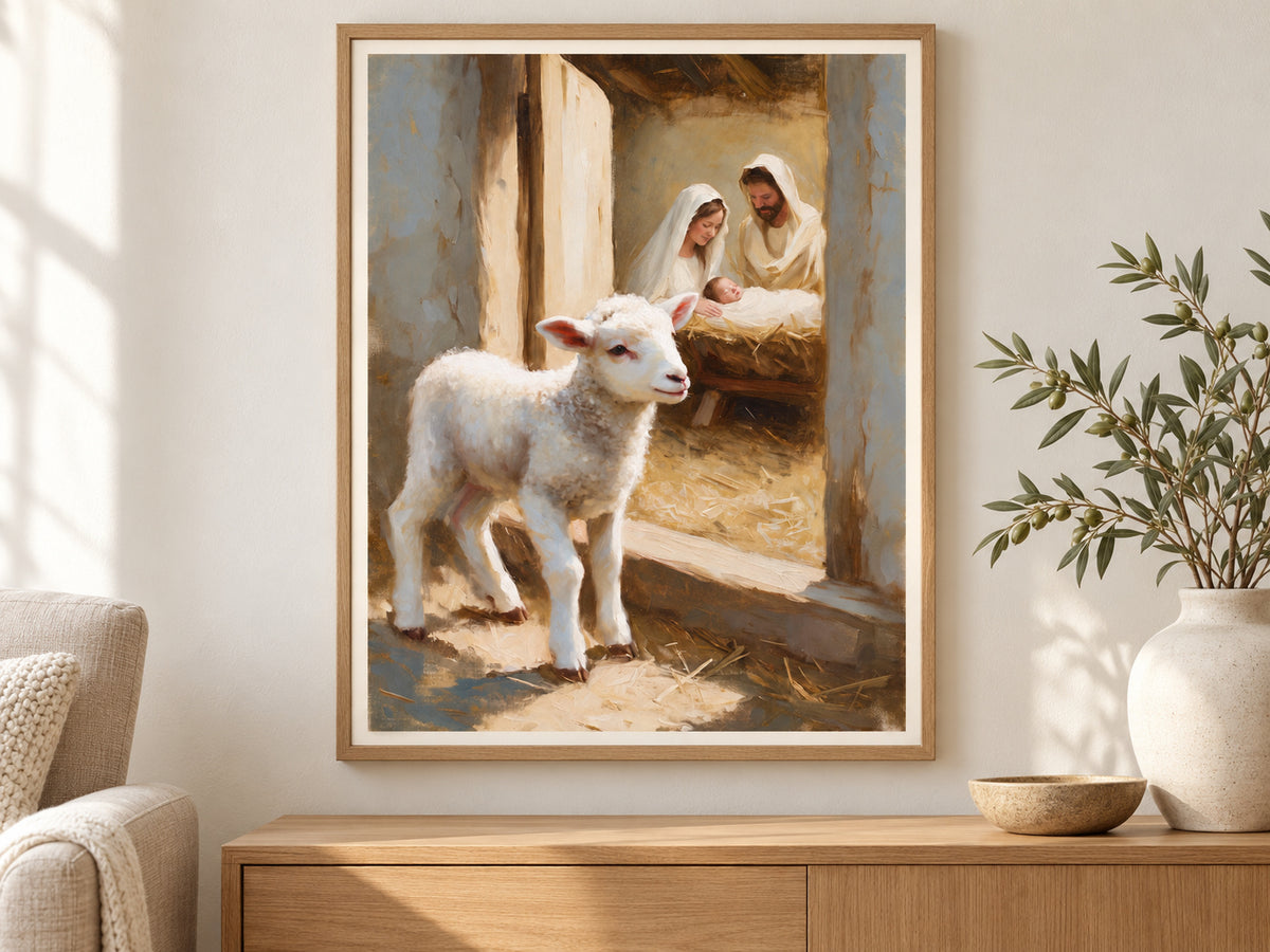 A Lamb Beside the Manger in a slim oak frame above a console in a sunlit living room