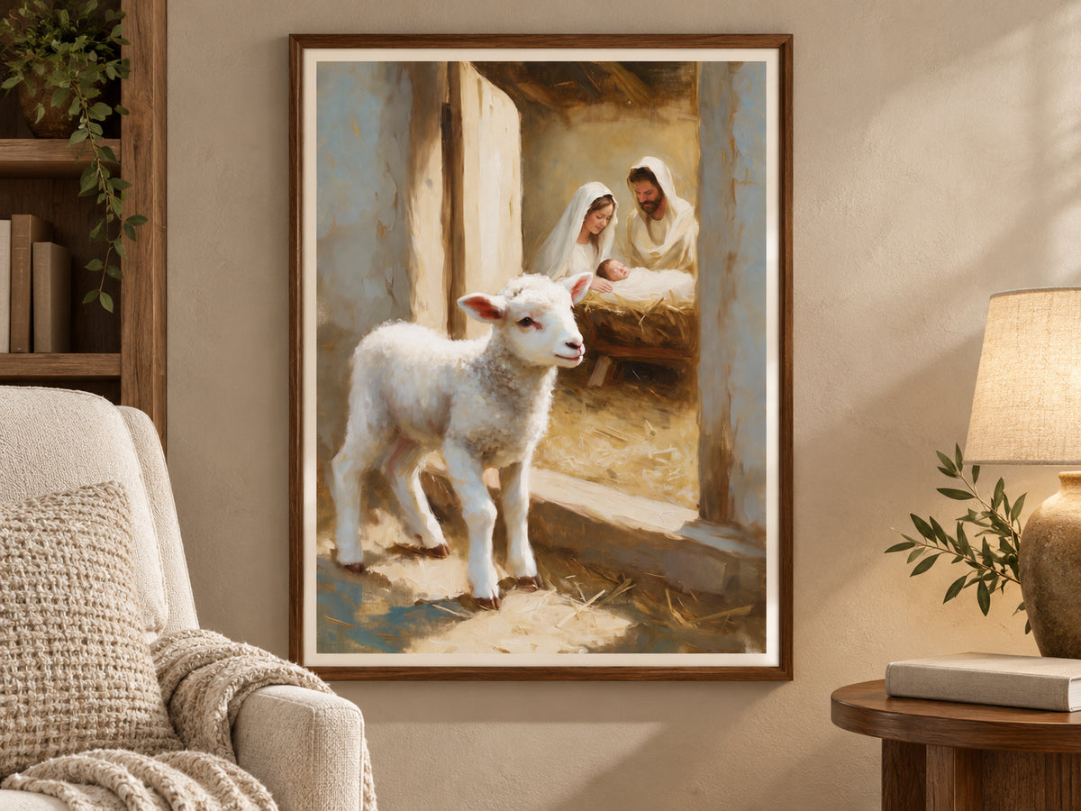A Lamb Beside the Manger in a walnut frame beside a cream reading chair