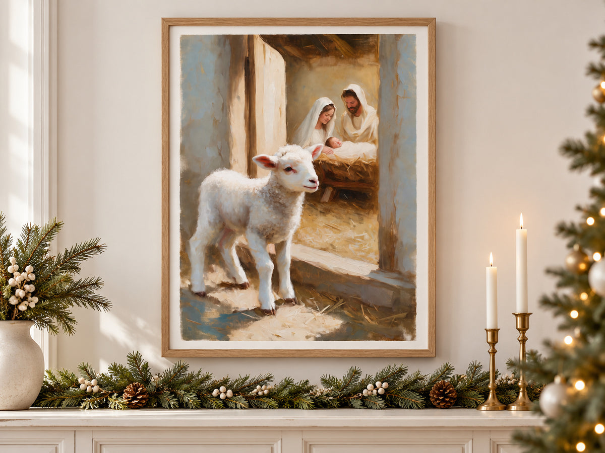 A Lamb Beside the Manger in an oak frame above a console styled with evergreen and brass for Christmas