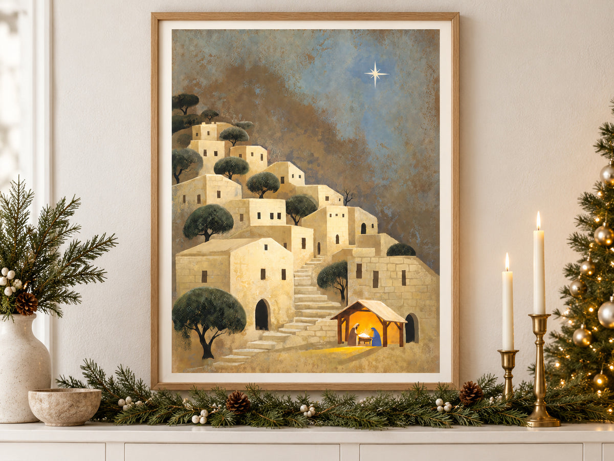 Light Over Bethlehem in an oak frame above a console styled with evergreen and brass for Christmas