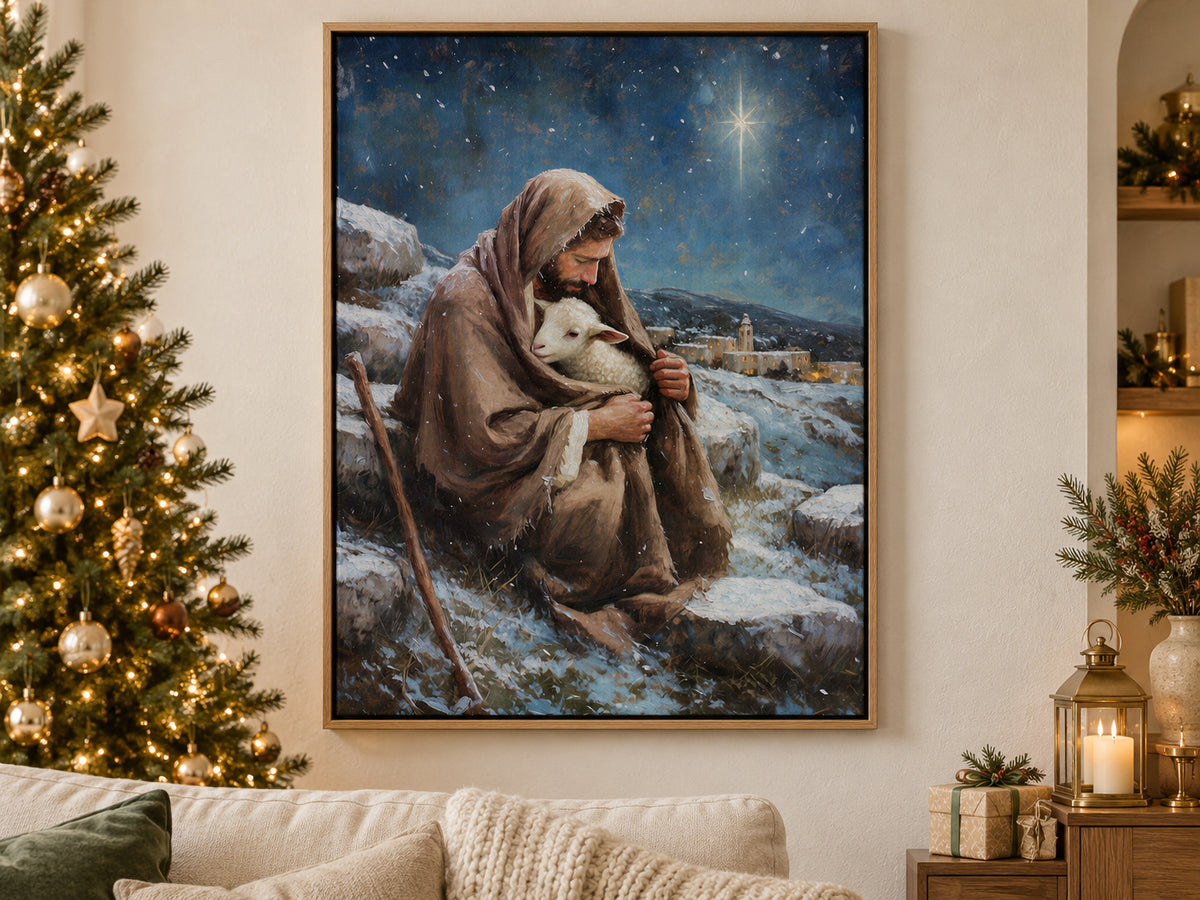 A bearded shepherd holds a white lamb inside his brown cloak on a snowy hillside. A bright star shines in a deep blue sky above a village with warm windows. Shown as a vertical canvas print in christmas canvas tree living room setting.