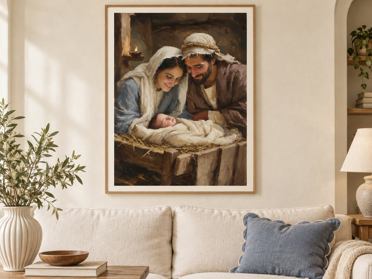 Mary and Joseph lean over baby Jesus asleep in a wooden manger. Cream cloth, Mary's blue robe, and a small oil lamp brighten the brown stable. Shown as a vertical paper print in paper collected linen setting.